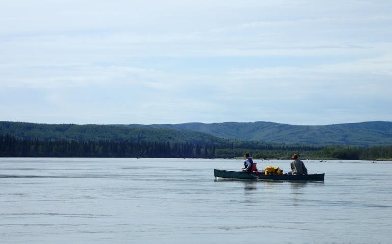 Jason Clark and Alison Beamer float the lower Tanana River. Photo by Ned Rozell.