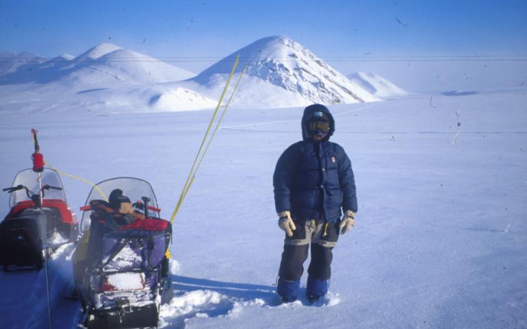  Glen Liston of Colorado State University pauses during a snowmachine trek to the Mesa Site on Alaska's north slope. Liston, Matthew Sturm of Fairbanks, and four others will attempt a snow-sampling trip from Nome to Barrow in spring 2002. photo by Matthew Sturm. 