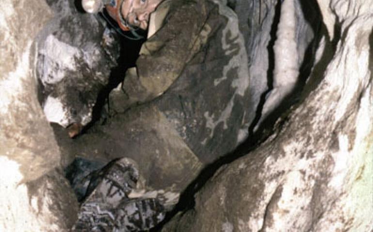  Fred Grady of the Department of Paleobiology at the Smithsonian Institution crawls into On Your Knees Cave in southeast Alaska, where Tim Heaton found the oldest known human remains in Alaska or Canada in 1996. Heaton, of the University of South Dakota, will return to Southeast limestone caves this summer. Tim Heaton photo. 