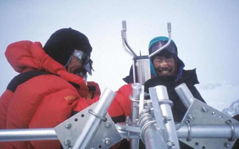  Yoshitomi Ukura, left, of the Japan Alpine Club, and Tohru Saito of UAF's International Arctic Research Center, work on a weather station installed high on Mt. McKinley. 