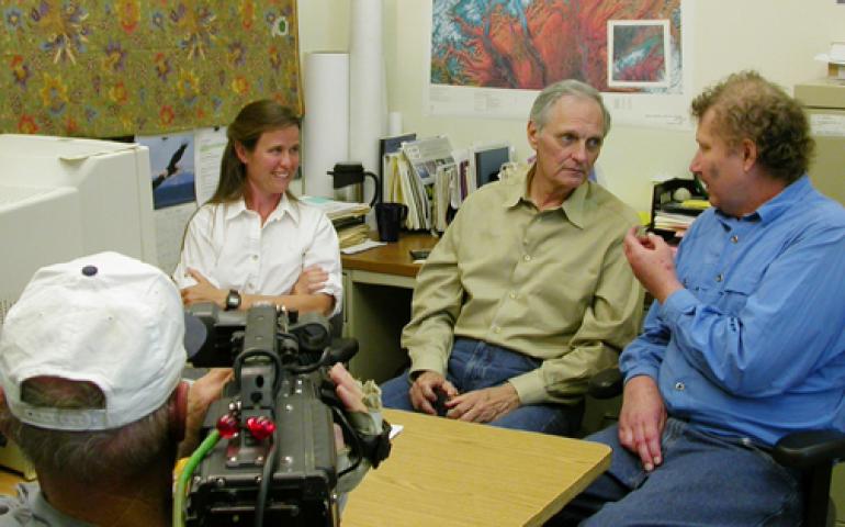  Alan Alda listens to glaciologists Keith Echelmeyer and By Valentine as Peter Hoving films possible footage for a Scientific American Frontiers special on warming in Alaska. Ned Rozell photo. 