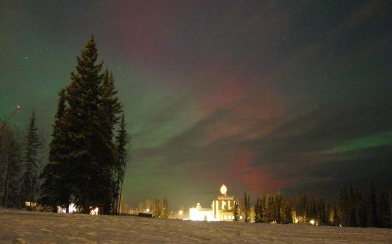  Todd Parris, a graduate student at the University of Alaska Fairbanks, took this photo of solar-flare induced red aurora over the Geophysical Institute on the UAF campus the evening of Oct. 28, 2003 at about 10:15 p.m. Todd Parris photo. 
