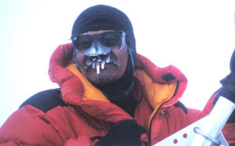 Yoshitomi Okura works on a weather station at 18,733 feet on Mt. McKinley. In June 2004 he will return with a team of climbers from Japan and from UAF in an attempt to repair the station. Photo by Ned Rozell. 