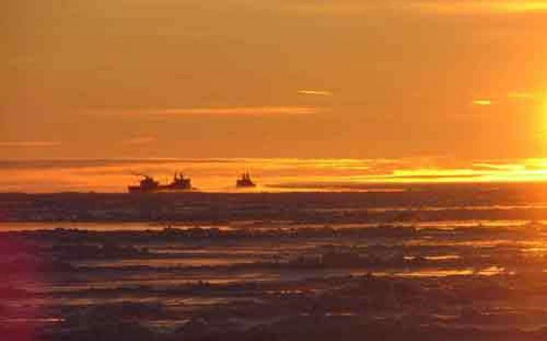  Russian nuclear-powered icebreakers open a path for cargo ships in the Laptev Sea in September 2004. This portion of the Arctic Ocean has much less ice this year. Photo by Sergey Kirillov, Arctic and Antarctic Research Institute, Russia. 