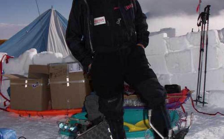  Yoshitomi Okura on Denali with components for a weather station at 18,733 feet on the mountain. Photo by Tohru Saito. 