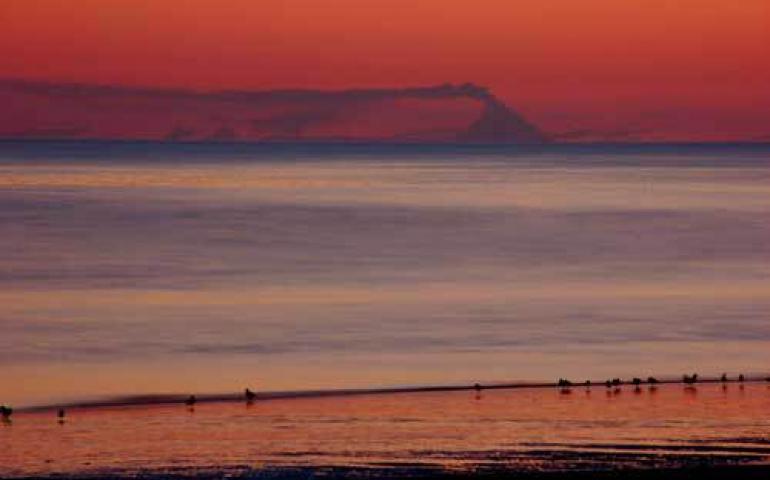  Augustine volcano viewed from Homer Spit in September 2006. Photo courtesy Tom Harnish and Alaska Volcano Observatory. 