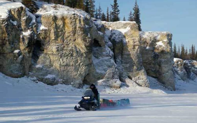  Dan Solie heads toward Old Crow up the Porcupine River during a long scientific traverse in Spring 2007. Photo by Henry Huntington. 