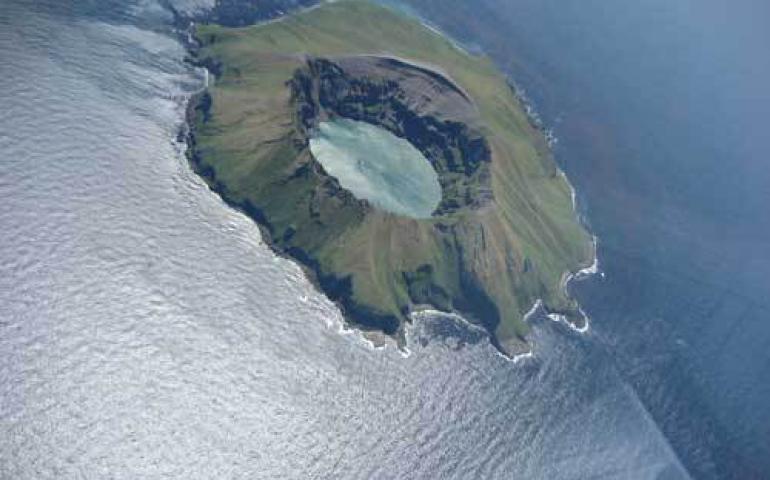  Kasatochi Island grew 31 percent during its eruption on Aug. 7, 2008, losing thousands of seabirds and all its plant life. Kasatochi Island before the eruption. 