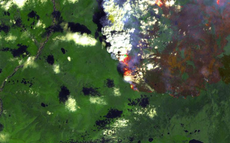  A fire scar in the making near Venetie, Alaska on June 24, 2004. Image courtesy U.S. Geological Survey and Geographic Information Network of Alaska.