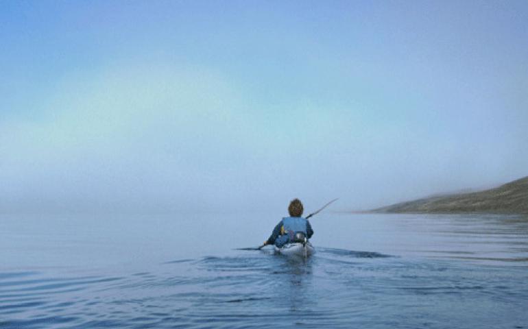  Keith Echelmeyer paddles on a two-month wilderness trip through the Brooks Range and Alaska’s North Slope. Photo by Chris Larsen.