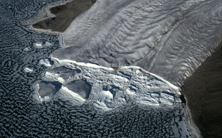 A tidewater glacier calving into Hayes Fiord, on Ellesmere Island in Canada’s Arctic. Photo by Gabriel Wolken. 