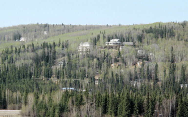 A parachute and a rocket payload as seen from a small aircraft over northern Alaska the same day the rocket launched from Poker Flat Research Range in Chatanika, Alaska, 170 miles away. Photo by Ned Rozell