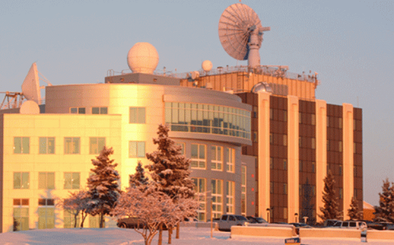 The Alaska Satellite Facility uses the 10-meter receiving antenna on top of UAF’s Elvey Building, at right, on the west ridge of the UAF campus. The building at left houses the International Arctic Research Center. Photo by Ned Rozell.