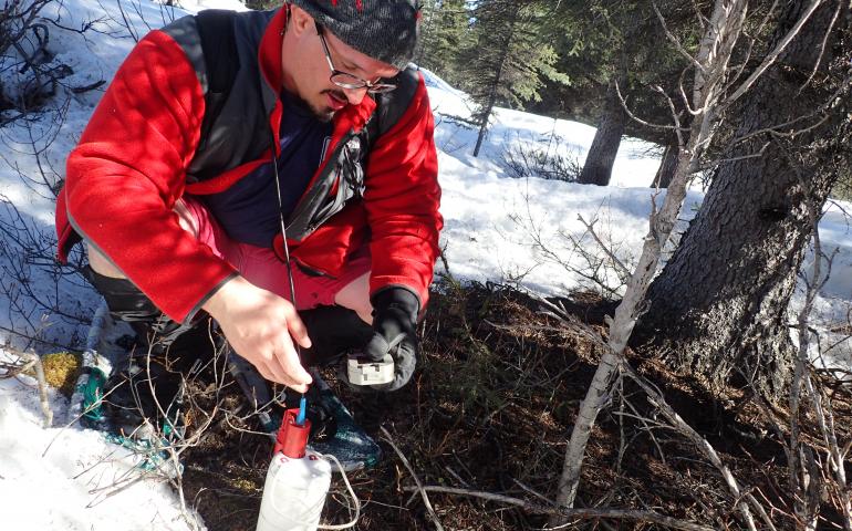 Amir Allam of the University of Utah and UAF installs a temporary seismometer near the Denali Fault between Delta Junction and Glennallen.