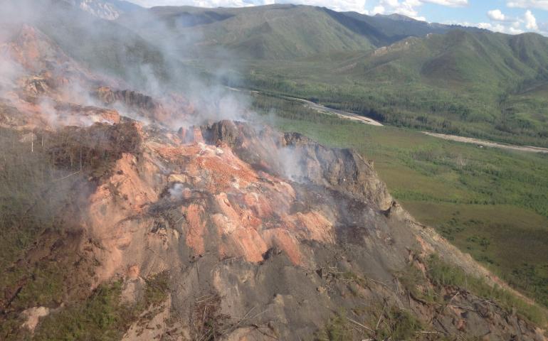 An aerial view of the Windfall Mountain Fire with the Tatonduk River in the background. National Park Service photo by Linda Stromquist.