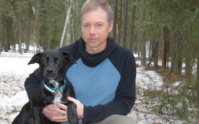 Ned Rozell and his dog Cora in 2017.