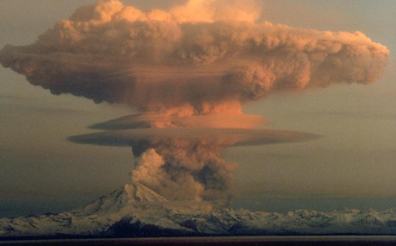 Mount Redoubt west of Kenai erupts an ash cloud on April 21, 1990, during the same unrest that launched the fledgling Alaska Volcano Observatory. Photo by Robert Clucas.