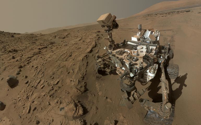 A self-portrait taken by the car-size Curiosity rover on the surface of Mars in April/May 2014. Image courtesy NASA/JPL-Caltech/MSSS.