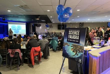 The audience listens to one of several brief science presentations in The Pub at the University of Alaska Fairbanks at the start of the 2023 Science for Alaska talk series. The 2024 talk series begins Thursday, Feb. 1, at The Pub. UAF/GI photo by Rebecca Beltran.