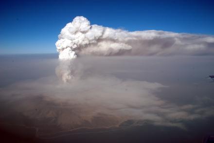 A steam plume with minor ash extends northeast from Augustine Volcano on Jan. 30, 2006. Photo by R.G. McGimsey/Alaska Volcano Observatory/U.S. Geological Survey 