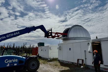 A portion of the new lidar is lifted into the dome at the Subauroral Geophysical Observatory in Gakona, Alaska, in late June 2025.. SAGO also houses the HAARP facility. Photo courtesy of Mike Roddewig