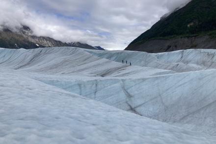 Participants in a 2022 international glaciology summer school walk on Root Glacier near McCarthy, Alaska, in 2022. Photo by Albin Wells