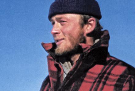Carl Benson pauses during one of his traverses of Greenland in 1953, when he was 25. Photo courtesy of the UAF Geophysical Institute.