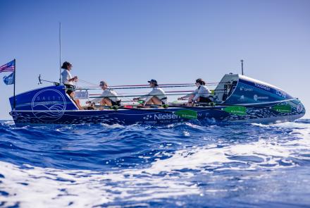 From left, Lauren Shea, Chantale Bégin, Isabelle Côté and Noelle Helder propel their 28-foot boat Emma off the coast of Florida during a training run for their crossing of the Atlantic Ocean. Photo courtesy Noelle Helder.