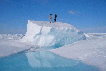 Matt Druckenmiller, right, and his research advisor Hajo Eicken, a professor of Geophysics, on an ice floe near Utqiaġvik in about 2010. Photo by Daniel Pringle.