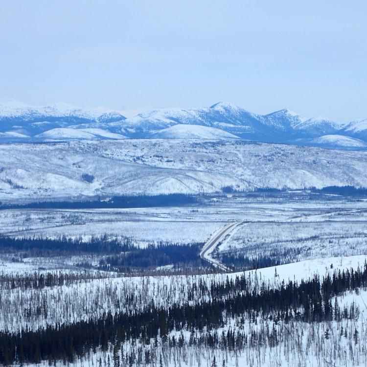 The Dalton Highway winds through the Jim River and Prospect Creek valleys in northern Alaska, where an official thermometer registered Alaska’s all-time low of minus 80 degrees F on Jan. 23, 1971. Photo by Ned Rozell. 